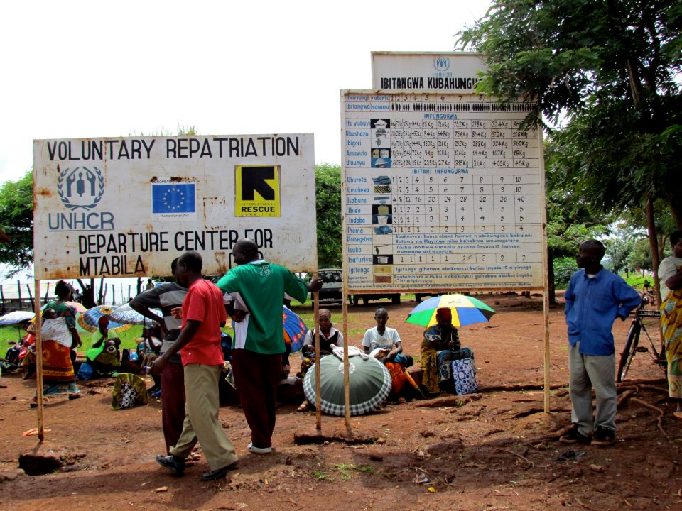 Refugee camp with NGO signs